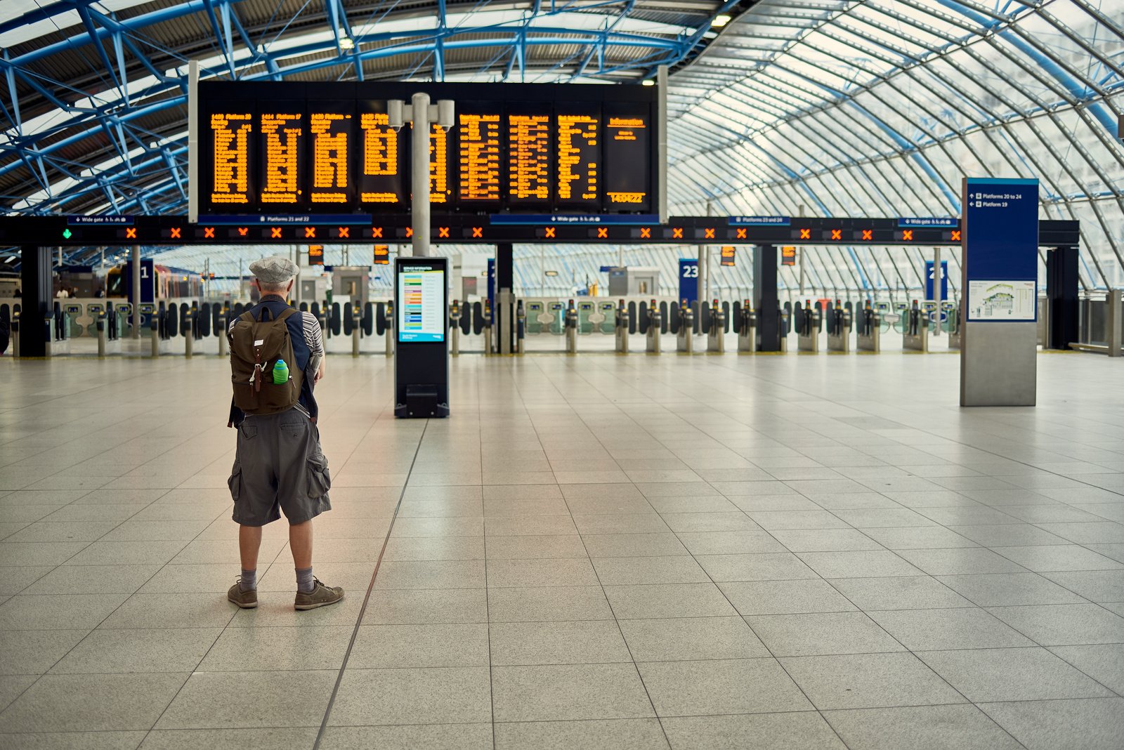 Person Standing Inside Airport Building